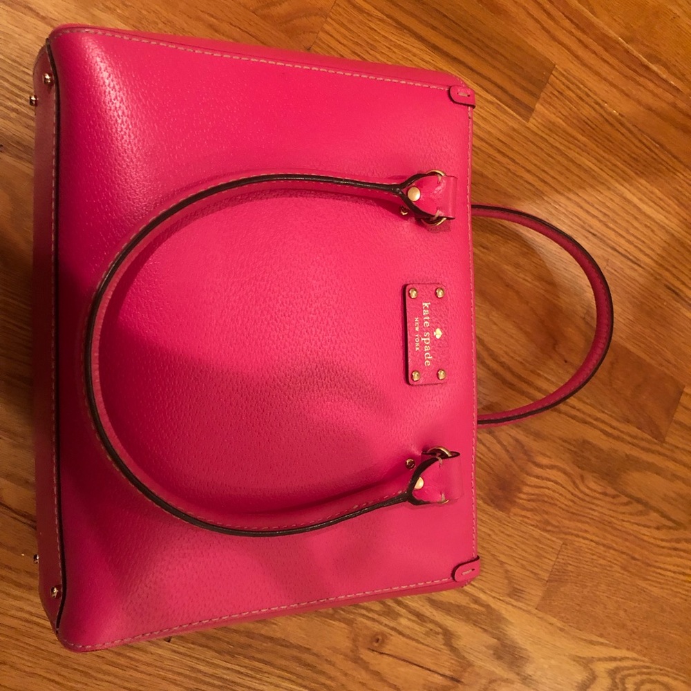 Hot pink Kate Spade bag and matching wallet.